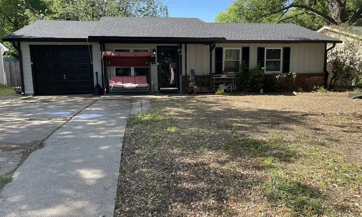 Roof Replacement crew at work on a residential roof in Natchitoches